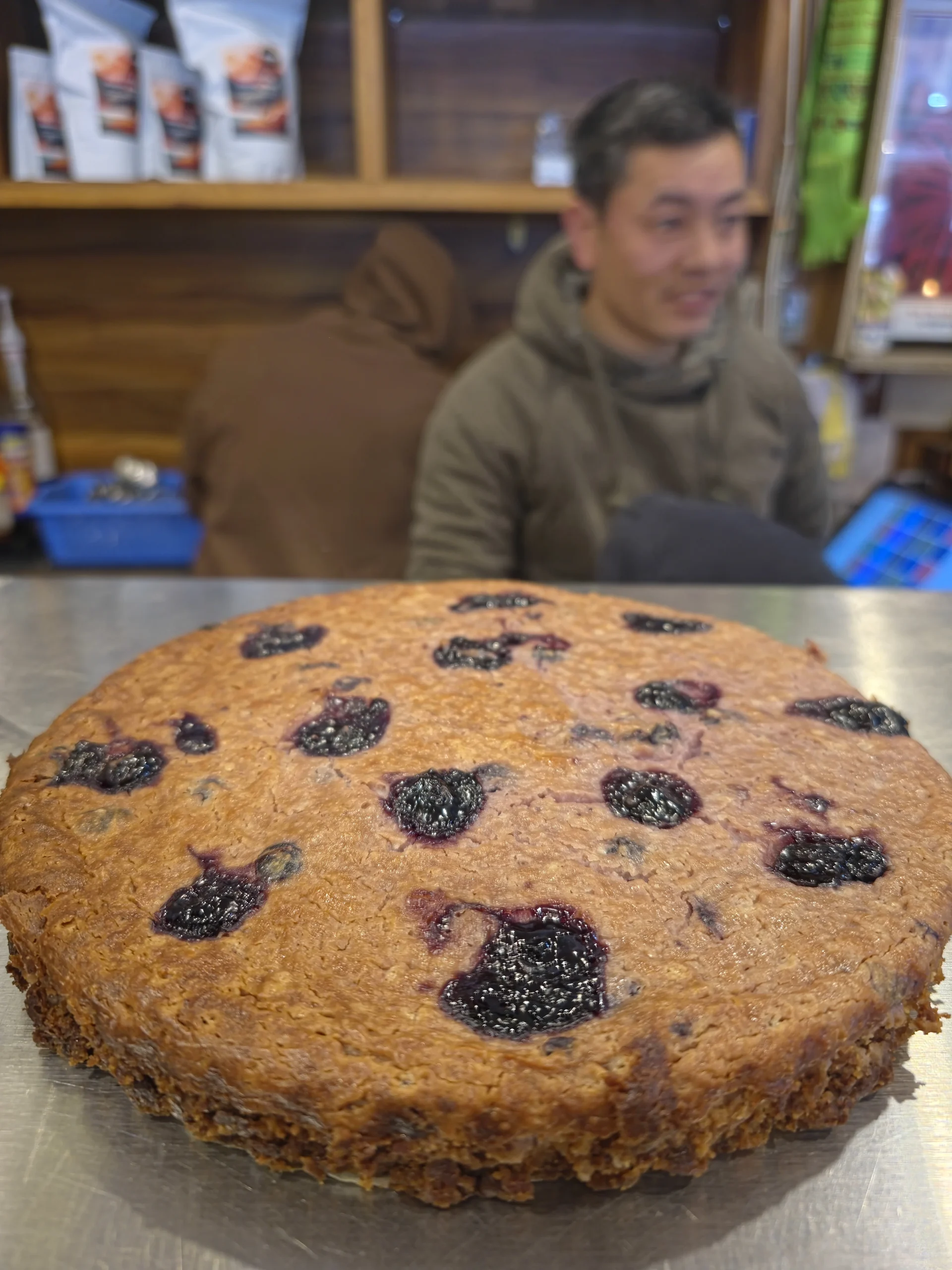 A person reading a book with a coffee